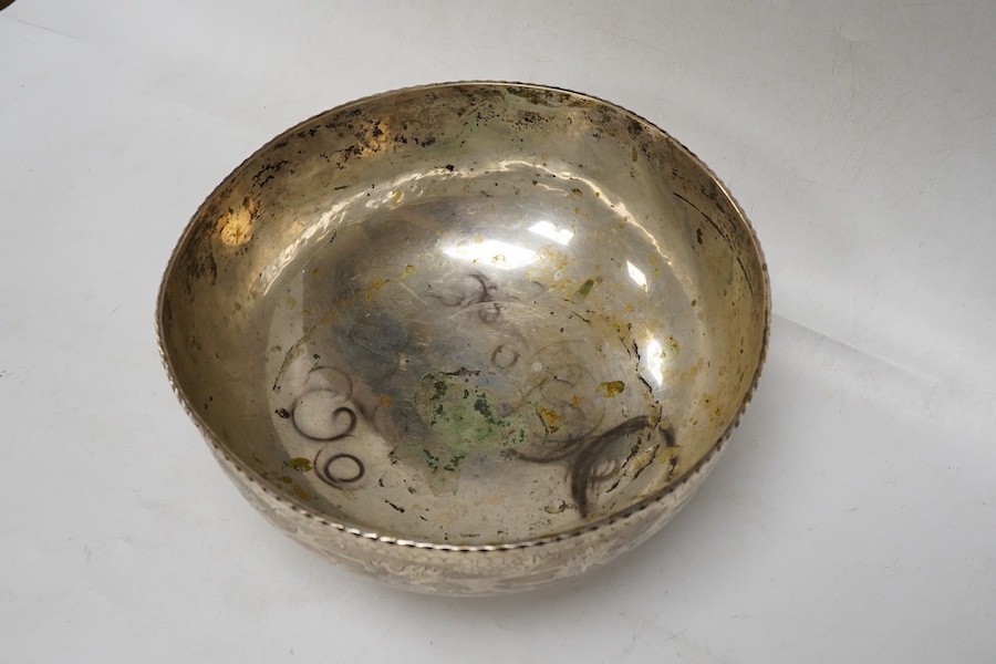 A continental circular white metal bowl with engraved fruiting vine decoration, diameter 19.8cm, 14oz.